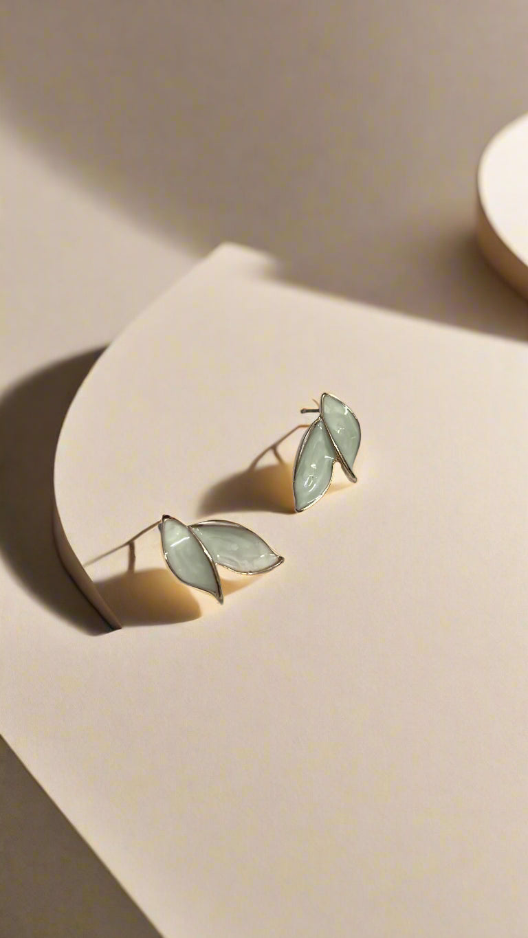 Elegant White Leaf Stud Earrings – Rose Gold Trim
