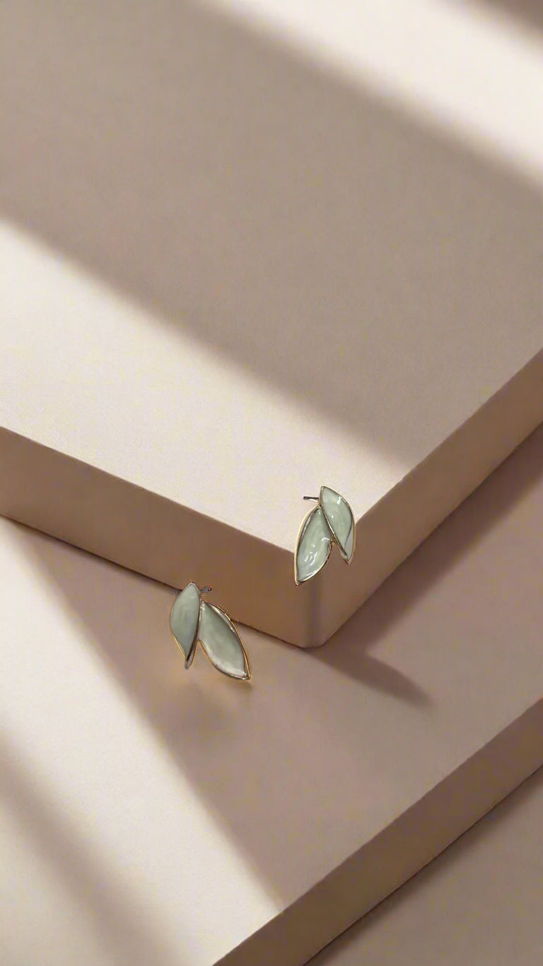 Elegant White Leaf Stud Earrings – Rose Gold Trim