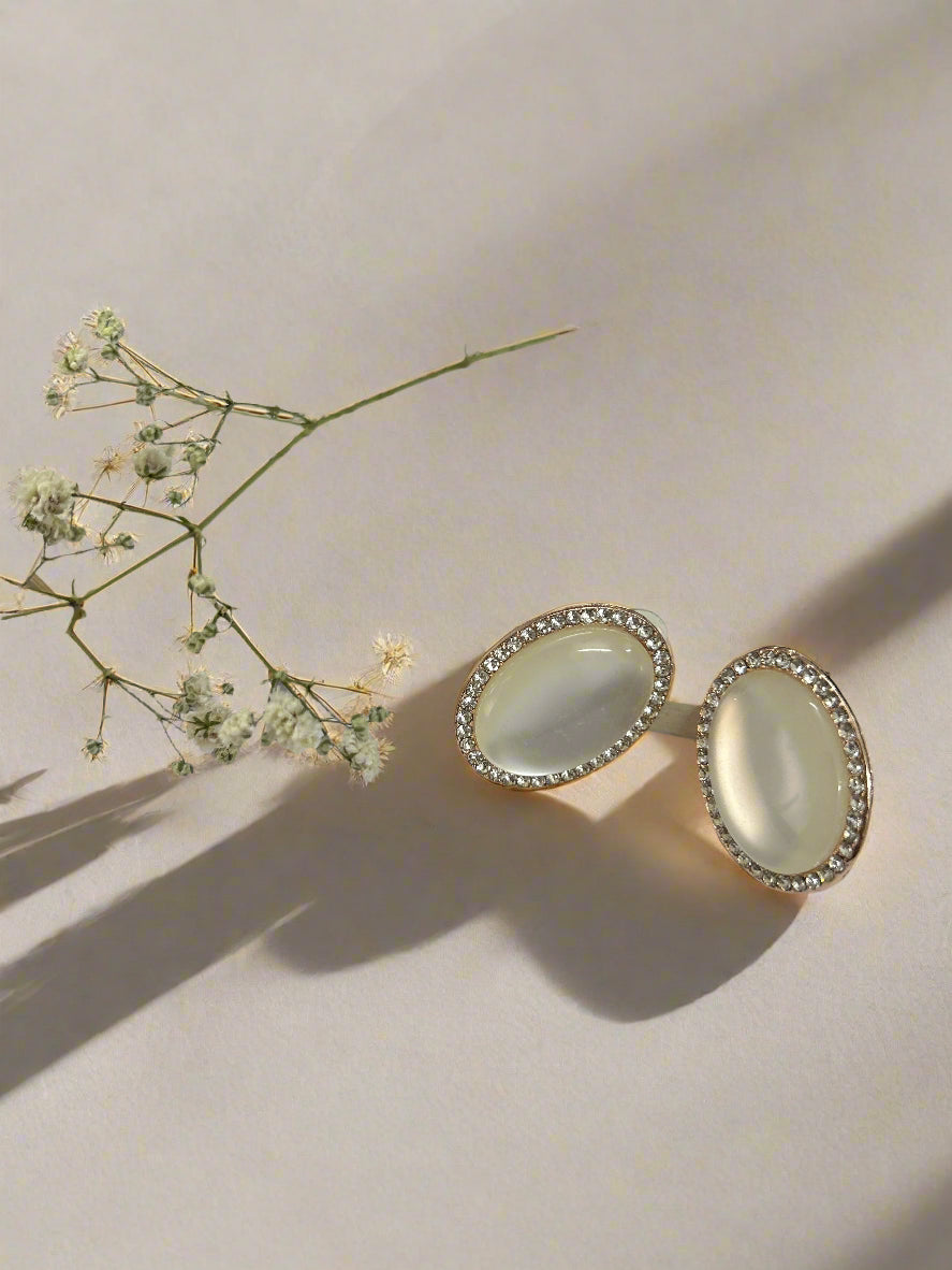 Classic White Oval Stud Earrings – Gold Rim with Diamond Accents