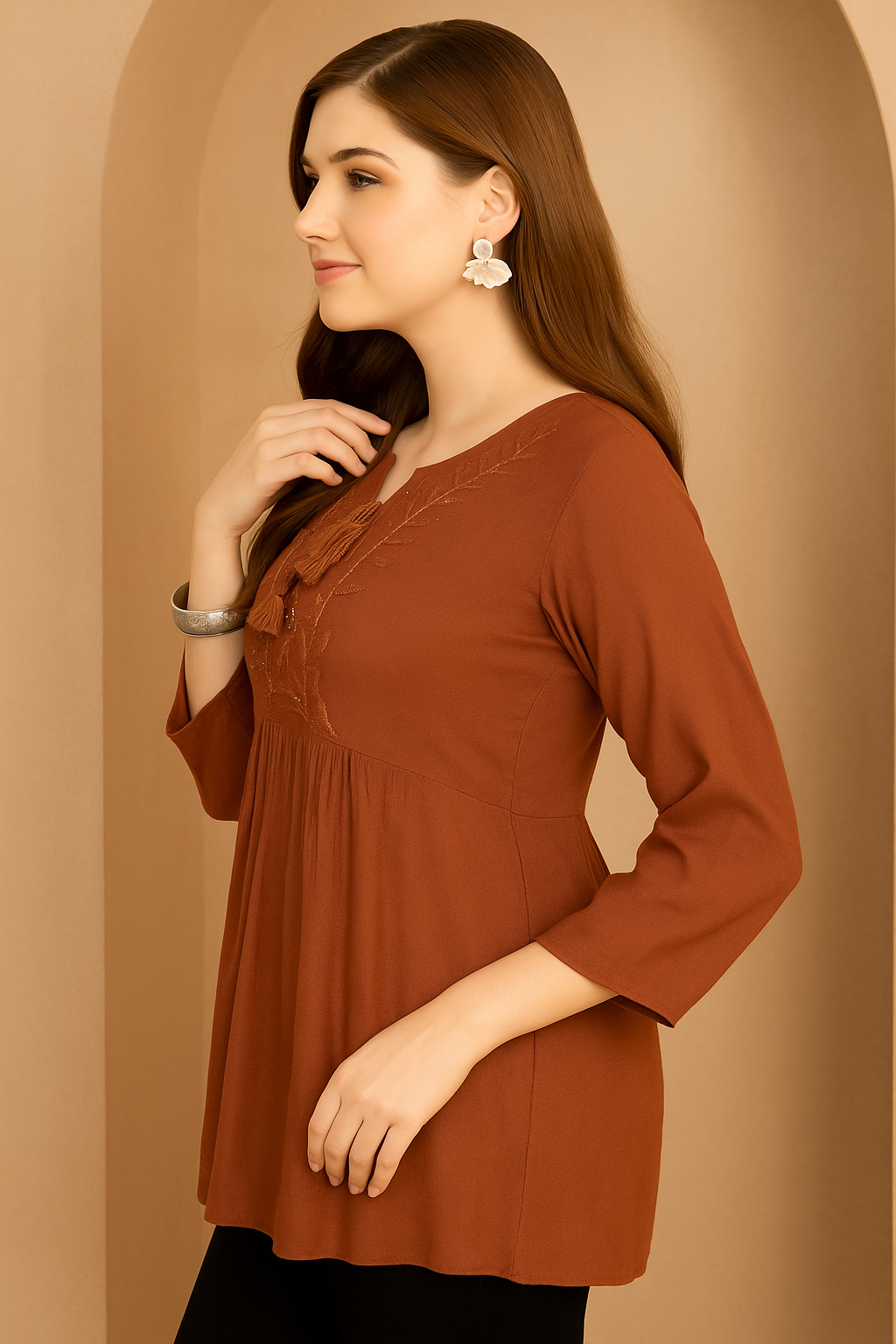 Women's Rust Embroidered Peplum Top with Tassel Neck Detail