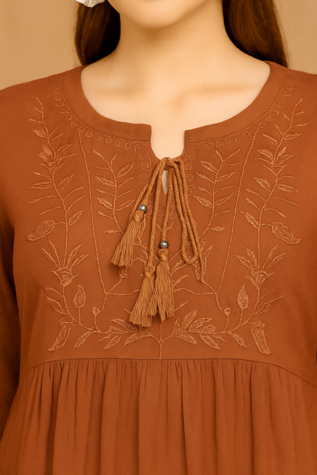 Women's Rust Embroidered Peplum Top with Tassel Neck Detail